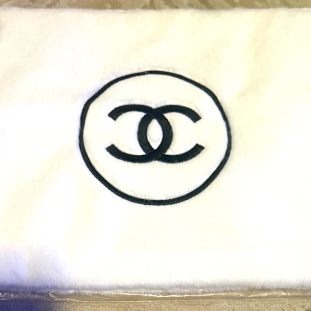 Absolutely adorable authentic rare,collectible white Chanel furry pouch/clutch.